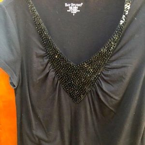 Black tee short sleeve with  BBM paillettes in front never worn brand Bay Studio